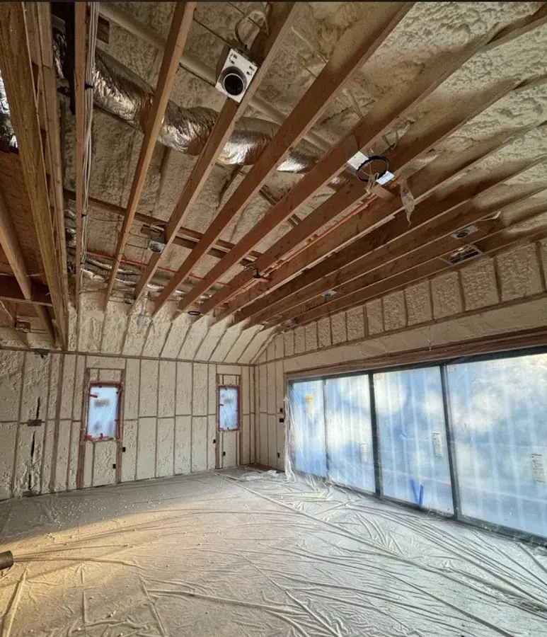Interior walls and ceiling insulated with spray foam during new construction in Harrisburg